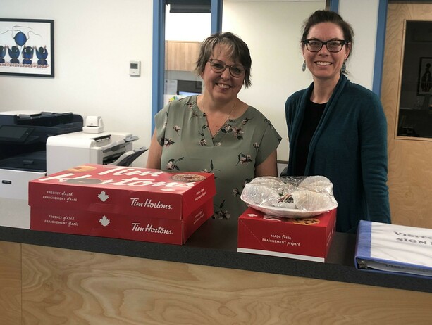 Parkdale's Princial Sandra Wilson and Admin Asst Deanne Didrickson with donuts for the staff