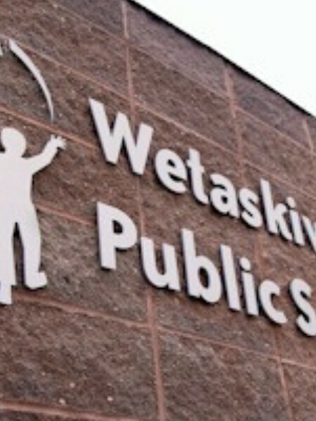wetaskiwin regional public schools logo on side of brick building